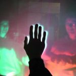 TouchLight: An Imaging Touch Screen and Display for Gesture-Based Interaction