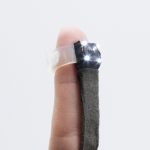 MagniFinger: Fingertip-Mounted Microscope For Augmenting Human Perception