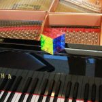 CubeHarmonic: A New Musical Instrument Based on Rubik’s Cube with Embedded Motion Sensor