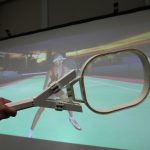 Ungrounded haptic rendering device for torque simulation in virtual tennis