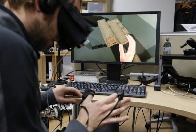 Altered Touch: Miniature Haptic Display with Force, Thermal and