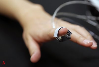 Submerged Haptics: A 3-DOF Fingertip Haptic Display using Miniat