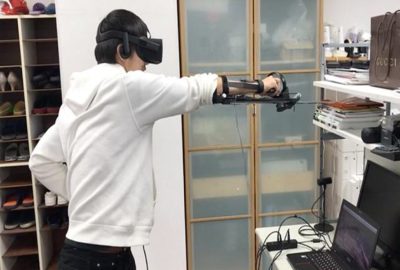 2018 ETech Yamashita: Gum-Gum Shooting: Inducing a Sense of Arm Elongation via Forearm Skin-stretch and the Change in the Center of Gravity