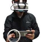 A Hybrid 2D-3D Tangible Interface for Virtual Reality