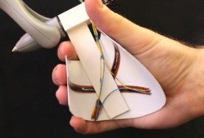 2013 Poster: Olsson_SplineGrip - An Eight Degrees-of Freedom Flexible Haptic Sculpting Tool