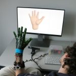 Interactive hand pose estimation using a stretch-sensing soft glove