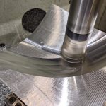 Geometry and tool motion planning for curvature adapted CNC machining