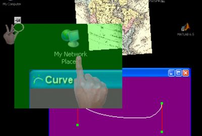 2006 Talks: Malik_Interacting with Large Displays from a Distance with Vision-Tracked Multi-Finger Gestural Input