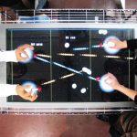 SA2008_ETech_Sato_An augmented tabletop video game with pinching gesture recognition