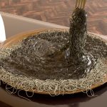 2019 SA Technical Papers_Fei_A multi-scale model for coupling strands with shear-dependent liquid